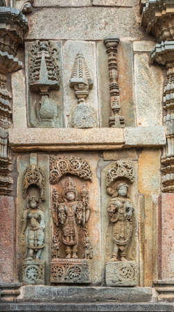 Belur, Karnataka, India - November 2, 2013: Chennakeshava Temple. Brown wall stone panel sculpture...