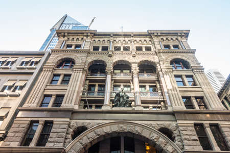 Sydney, Australia - February 12, 2019: Historic 330 George Street building with luxury shops such as High and Mighty, and Etoile Elite. Street scene early morning with people walking in street. The Royal George Bar.のeditorial素材