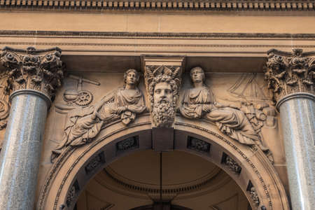 Sydney, Australia - February 12, 2019: Historic and Iconic General Post Office building facade on corner of Martin Place and , George Street. Classical alegorical figures statue above spandrel.のeditorial素材