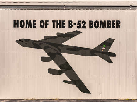 Darwin Australia - February 22, 2019: Australian Aviation Heritage Centre. Image of Boeing B-52 stratofortress bomber painted on the large movable doors of the hangar to let airplanes in and out.のeditorial素材