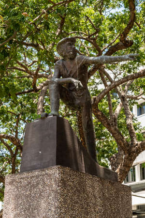 Darwin Australia - February 22, 2019: Statue of John McDouall Stuart set in small Raintree Park and Knuckey Street  under trees. Explorer traveled on camel from Darwin to Adelaide.のeditorial素材