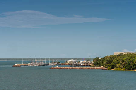 Darwin Australia - February 22, 2019: Coast Guard port and base at entrance to Darwin harbour, with docks, buildings and green zone.のeditorial素材