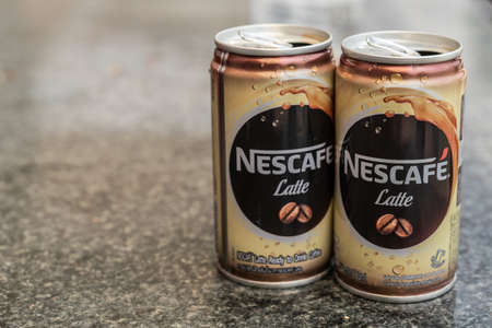 Sihanoukville, Cambodia - March 15, 2019: Closeup of two empty Nescafe Latte cans on counter top.のeditorial素材