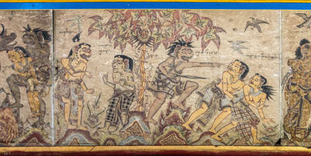 Klungkung, Bali, Indonesia - February 26, 2019: Kertha Gosa, Open sides Royal Court of Justice, ceiling full of paintings about punishments for bad behavior and rewards for good conduct. Close up of 1/13. Infidelity and adultery.のeditorial素材