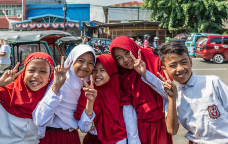Makassar, Sulawesi, Indonesia - February 28, 2019: Terong Street Market. Closeup of group of young...