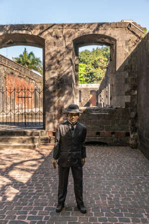 Manila, Philippines - March 5, 2019: Fort Santiago. Effigy of Jose Rizal, national hero, representing his last walk in the fortress to his execution. Surrounded by ruined walls.のeditorial素材