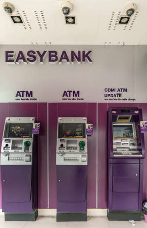 Chon Buri, Thailand - March 16, 2019: Purple Easybank ATM terminals under roof on Sukhumvit road street market.のeditorial素材