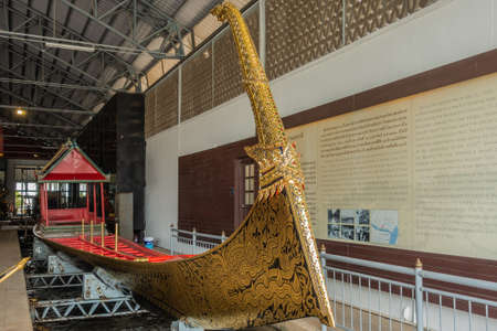 Bangkok city, Thailand - March 17, 2019: Royal Barge National Museum. The Ekachai Hern Hao Royal Barge seen from prow in wider hall.のeditorial素材