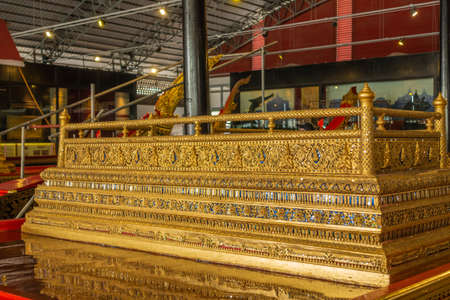 Bangkok city, Thailand - March 17, 2019: Royal Barge National Museum. Closeup of golden Royal Booth to be set on barge chosen by king, seen in wide hall.のeditorial素材