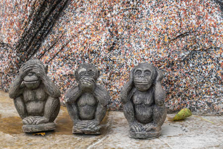 Ko Samui Island, Thailand - March 18, 2019: Wat Khunatam Buddhist Temple and monastery. Closeup of classic three wise monkeys statue: see no evil, hear no evil, speak no evil.の写真素材