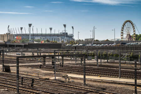 Melbourne, Australia - November 15, 2009: Marvel sports stadium and ferris wheel behind brown...