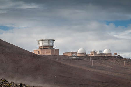 Haleakala Volcano, Maui, Hawaii, USA. - January 13, 2020: Observatory buildings and University of...