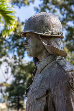 Oahu, Hawaii, USA. - January 10, 2012: Closeup of Bronze chest of  soldier statue as part of United In Sacrifice group statue at Schofield Barracks of Army 25th Infantry Division.のeditorial素材