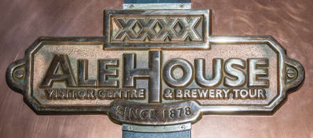 Brisbane, Australia - December 8, 2009: Castlemaine Perkins brewery. Closeup of brass sign on copper vessel for Ale House Brewery Tours.のeditorial素材