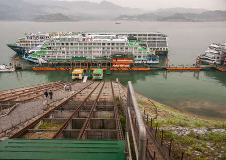 Three Gorges Dam, China - May 6, 2010: Yangtze River. 2 large passenger ships docked at Sandouping...