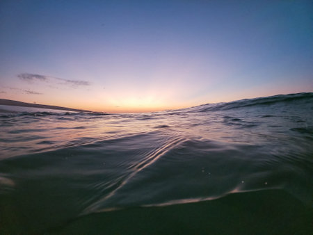 Sunrise over the ocean from the water