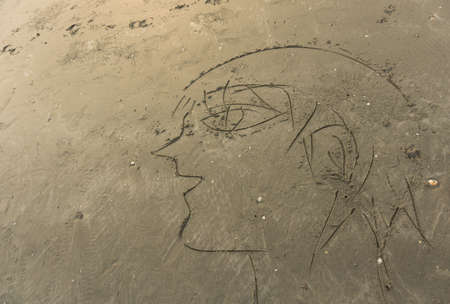 a drawing of man on the sea beach