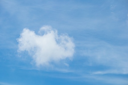 Blue sky with the white cloud in the sunny bright day, a good fine weather day to do outdoor activities and relax, giving a relaxation, vibrant, and freedom feelingの写真素材