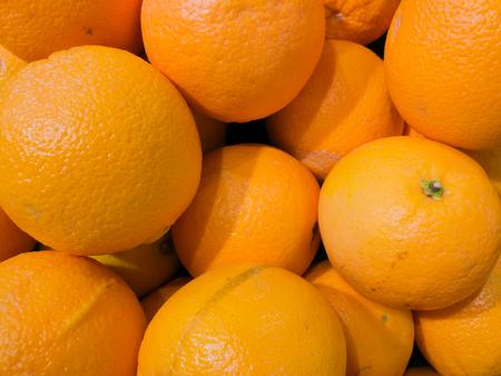 Plenty of oranges in the market in Thailandの写真素材