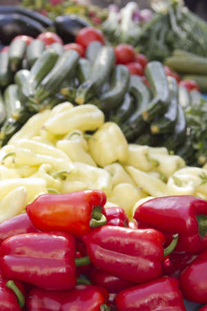 Beautiful arrangement of organic vegetable on sunny marketの写真素材