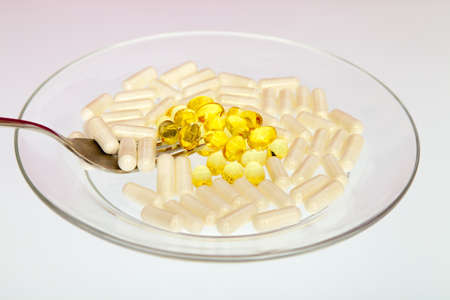 Pills on the glass plate