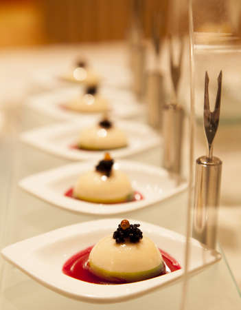 Finger food Fruits of the sea pudding with caviar