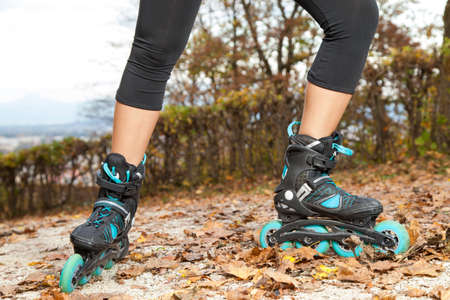 Feet of off road roller skater with in-line roller skates
