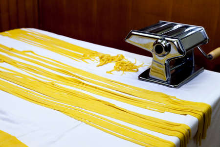 Making traditional italian pasta, ravioli, tagliatelle, fettuccini, step by step processの写真素材