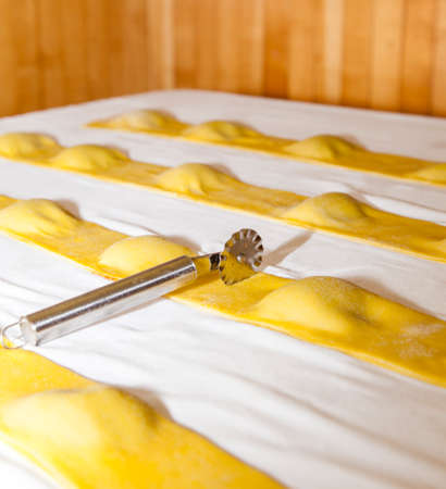 Making tasty italian pasta, Ravioli, grandi, for stuffing is used organic vegetables, step by step process, selective focusの写真素材