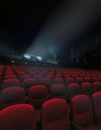 Empty red of seat and rows in cinema with projector lightingの写真素材