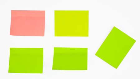 Five different colored paper sticky notes displayed before an isolated white background