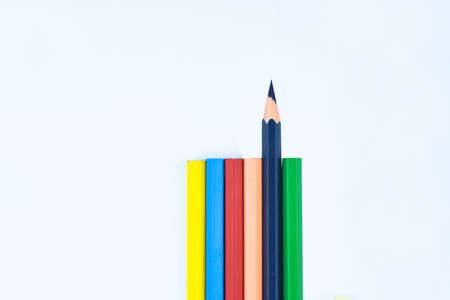 Six different colored wood pencil crayon while one facing the different wayの写真素材