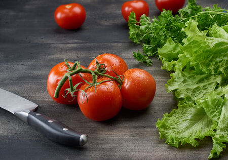 Kitchen knife on old rustic wooden tableの写真素材