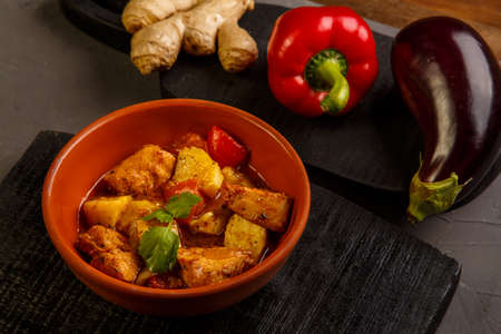 Food for suhoor in ramadan lamb stew with potatoes on a wooden board. Horizontal photoの写真素材