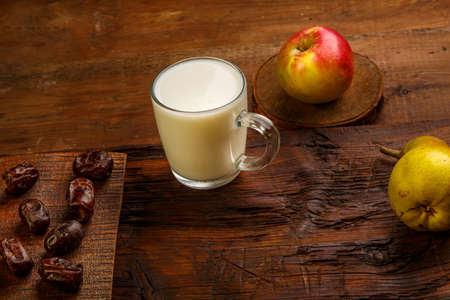 Iftar food for Ramadan fasting dates, fruits and ayran. Horizontal photoの写真素材