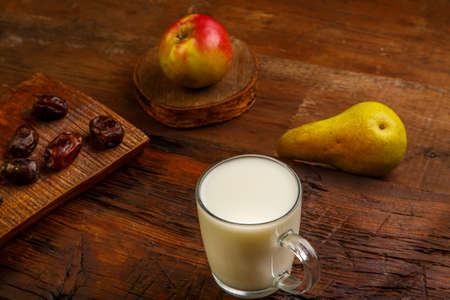 Iftar food for holy Ramadan dates, fruits and ayran. Horizontal photoの写真素材