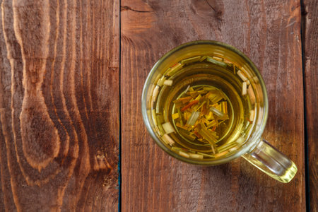 tea cup transparent lemongrass on wooden table top view.copy space Horizontal photoの写真素材