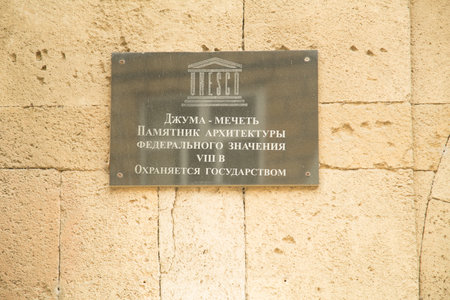 July 29, 2023. Russia, Republic of Dagestan, Derbent, a plaque on the wall of the Juma mosque in Russianのeditorial素材