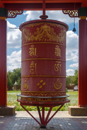 July 25, 2023. Russia, Republic of Kalmykia, Elista, Buddhist temple Golden Abode of Buddha Shakyamuni, prayer drums in the yard.のeditorial素材