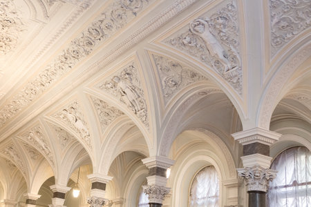 June 24, 2023 Russia, St. Petersburg, white hall of the Nikolaev Palace, ceiling with stuccoのeditorial素材