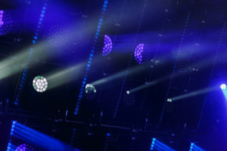 blue light and white cold rays from gun lighting devices demonstration. Horizontal photo.の写真素材