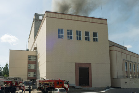 June 10, 2024 Russia, Ivanovo Fire on the roof of the administrative building, black smoke and soot....