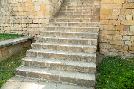 Staircase of an ancient fortress, old masonry made of ancient brick. Horizontal photo.の写真素材