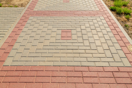 Paving slabs red geometric pattern texture. Horizontal photo.の写真素材