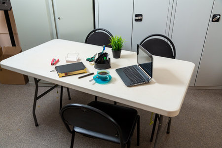 Office table with chairs and stationery, laptop Horizontal photo.の写真素材