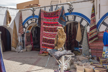 Carpet and wickerwork at the souk of Douz, Tunisia