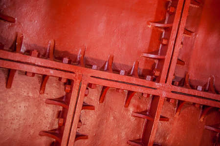 The inside of a red cast iron lighthouse.の写真素材