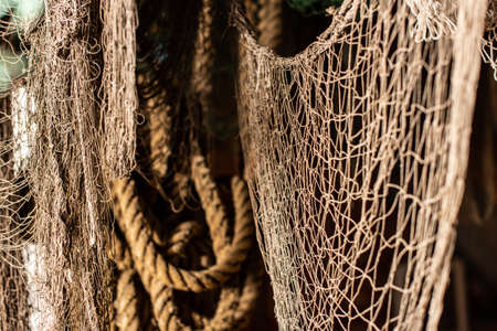 Vintage ropes and nets used in fishing a long time ago.