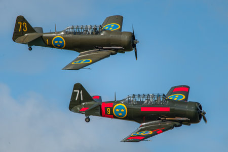 Gothenburg, Sweden - August 29 2009: SK16 Harvard, SE-FUD and SE-FVU at Göteborg Aero Show.のeditorial素材
