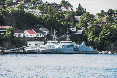 Norway, Mandal - August 8 2010: Former minehunter KNM Oksøy M340 and minesweeper KNM Glomma M354 of the Norwegian Navy laid up in Kleven.のeditorial素材